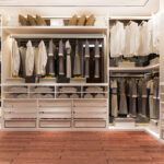 3d-rendering-luxury-scandinavian-wood-walk-closet-with-wardrobe-make-up-table